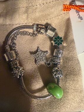 Silver Charm Bracelet with Green Bead and Sparkling Star Charm
